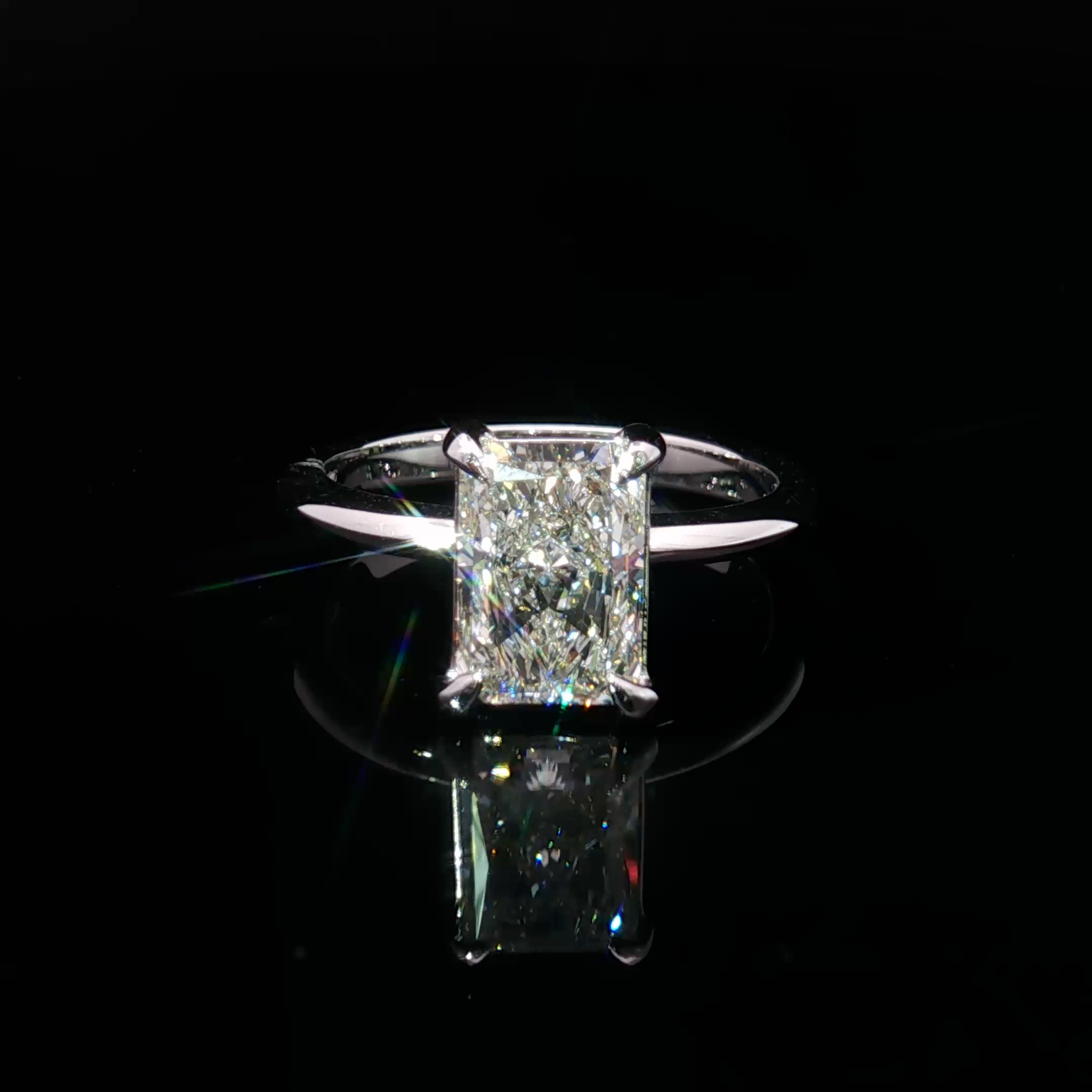 14K White Gold Solitaire Ring with Radiant Cut Diamond