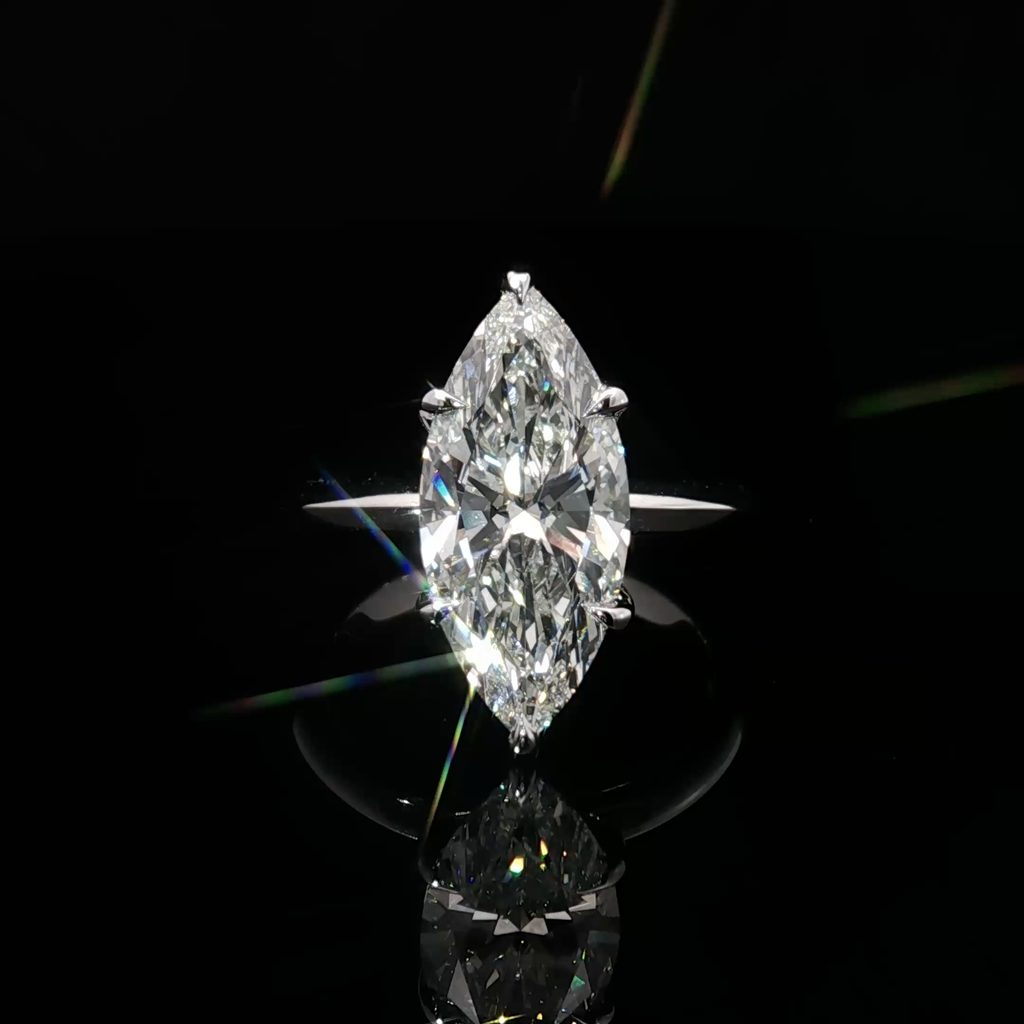 14k White Gold Solitaire Ring with Marquise Cut Diamond
