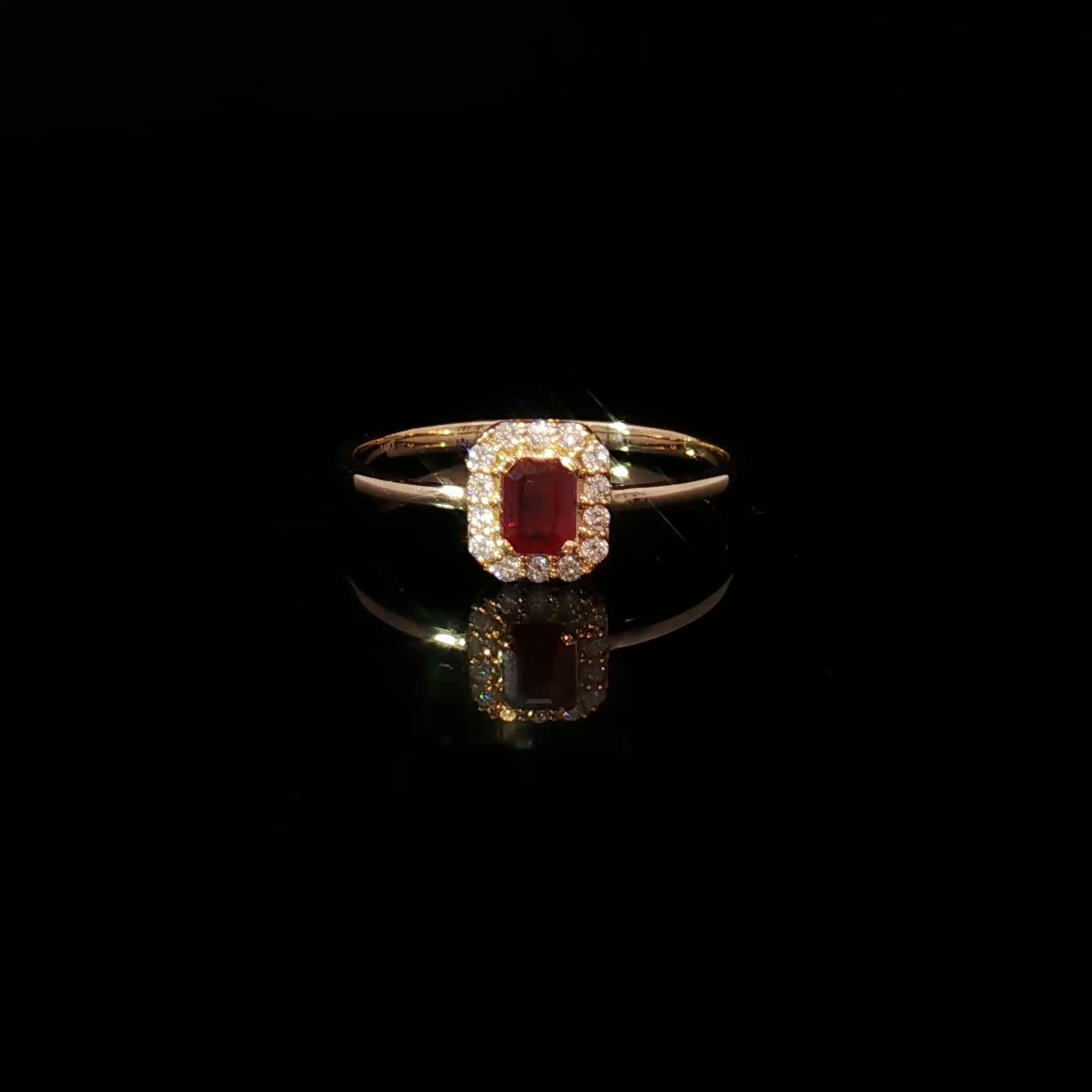 Yellow Gold Multistone Ring Featuring an Emerald Cut Ruby