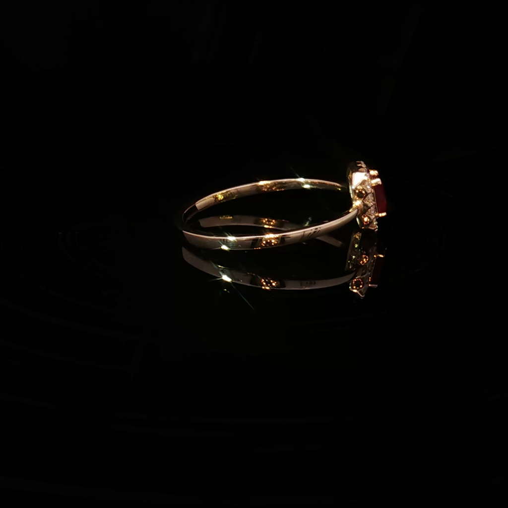 Yellow Gold Multistone Ring Featuring an Emerald Cut Ruby