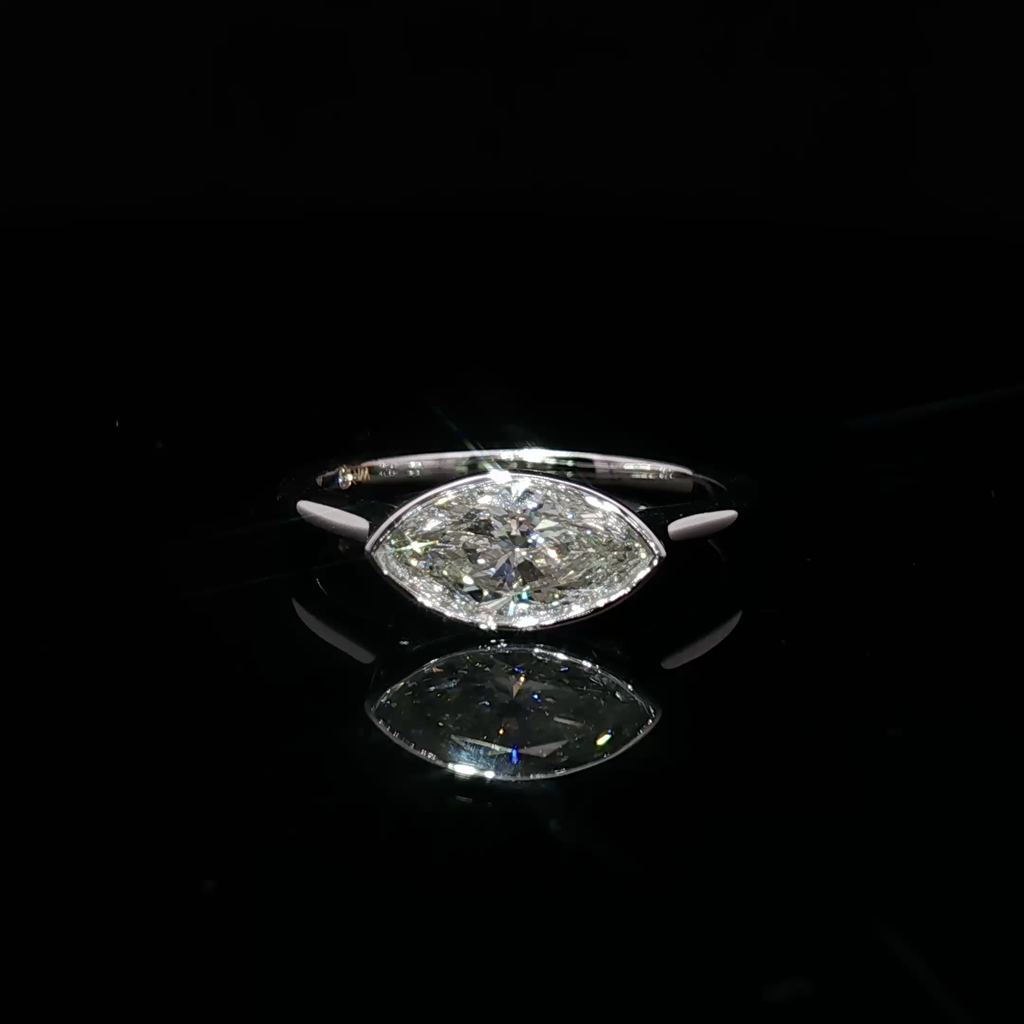 14K white Gold Solitaire Ring with Marquise Cut Diamond