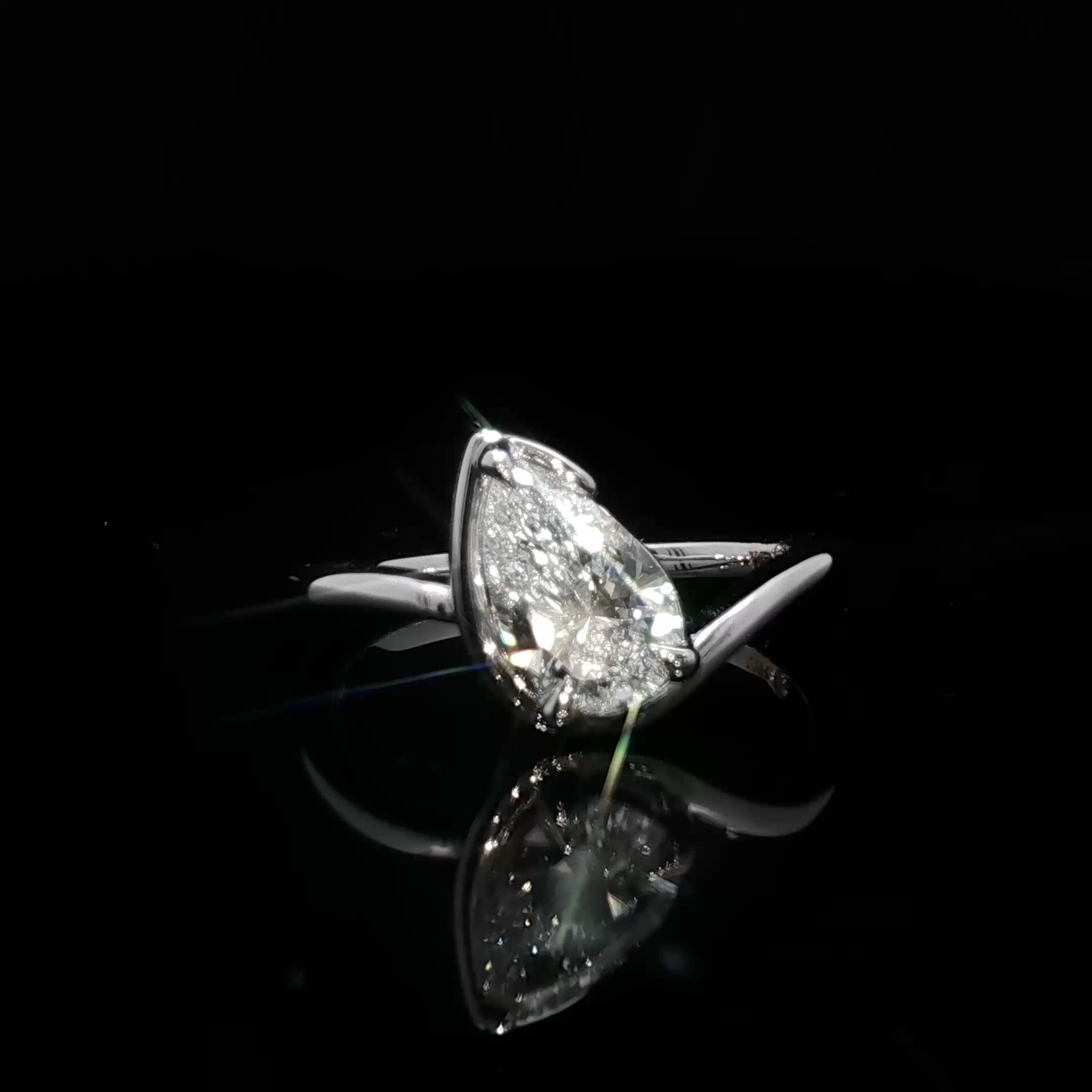 14K White Gold Solitaire Ring with Pear Cut Diamond