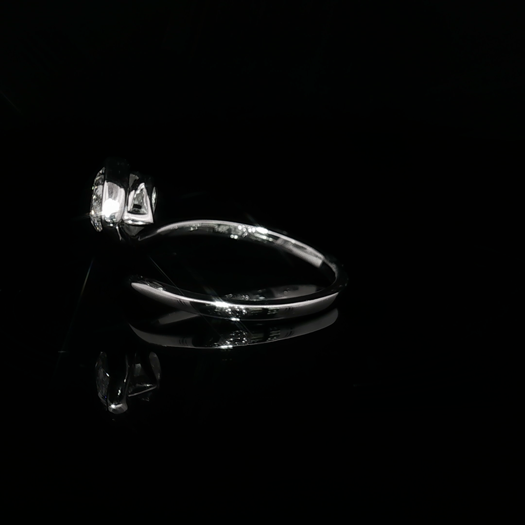 White Gold Solitaire Wrapping Ring with Pear Cut Diamond