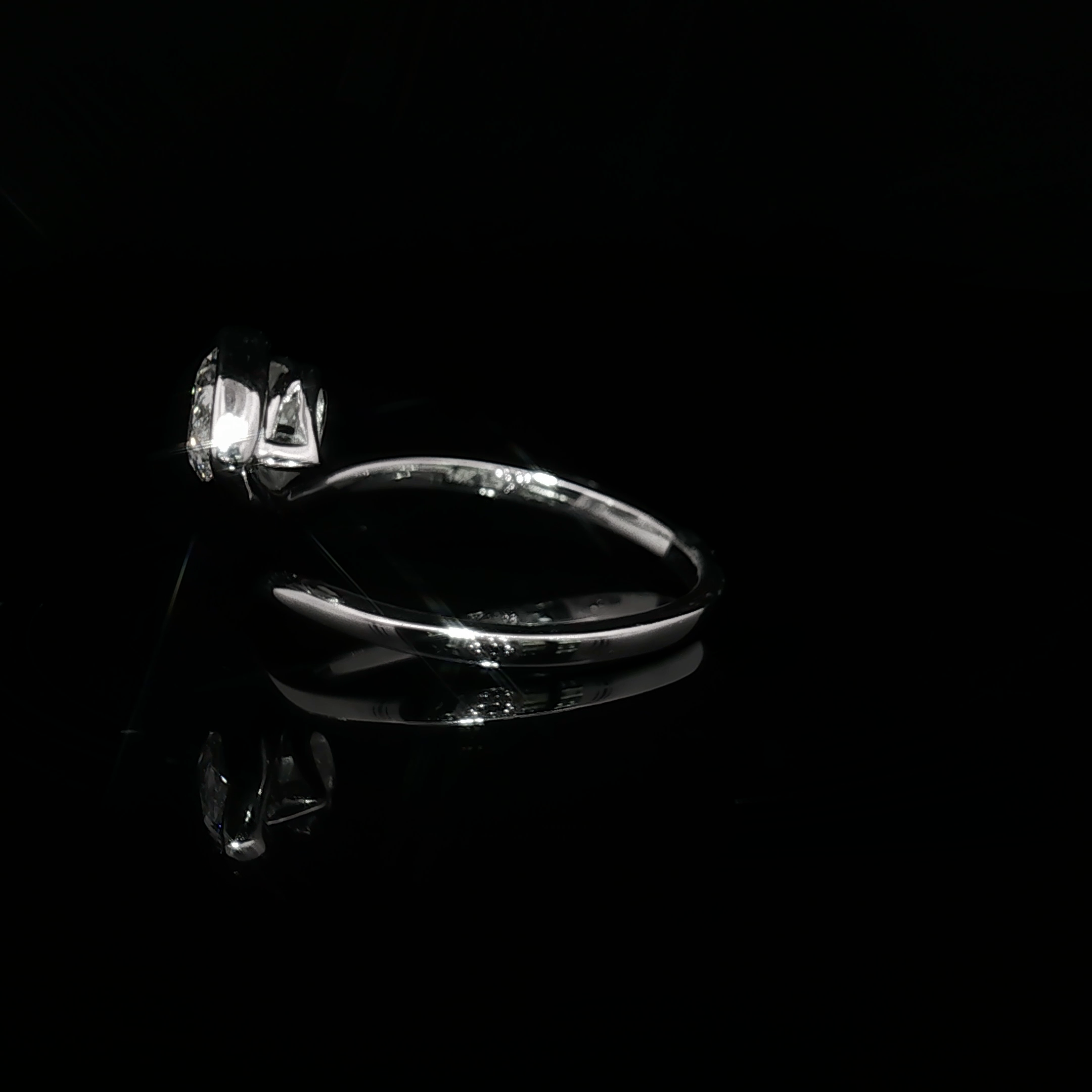 White Gold Solitaire Wrapping Ring with Pear Cut Diamond