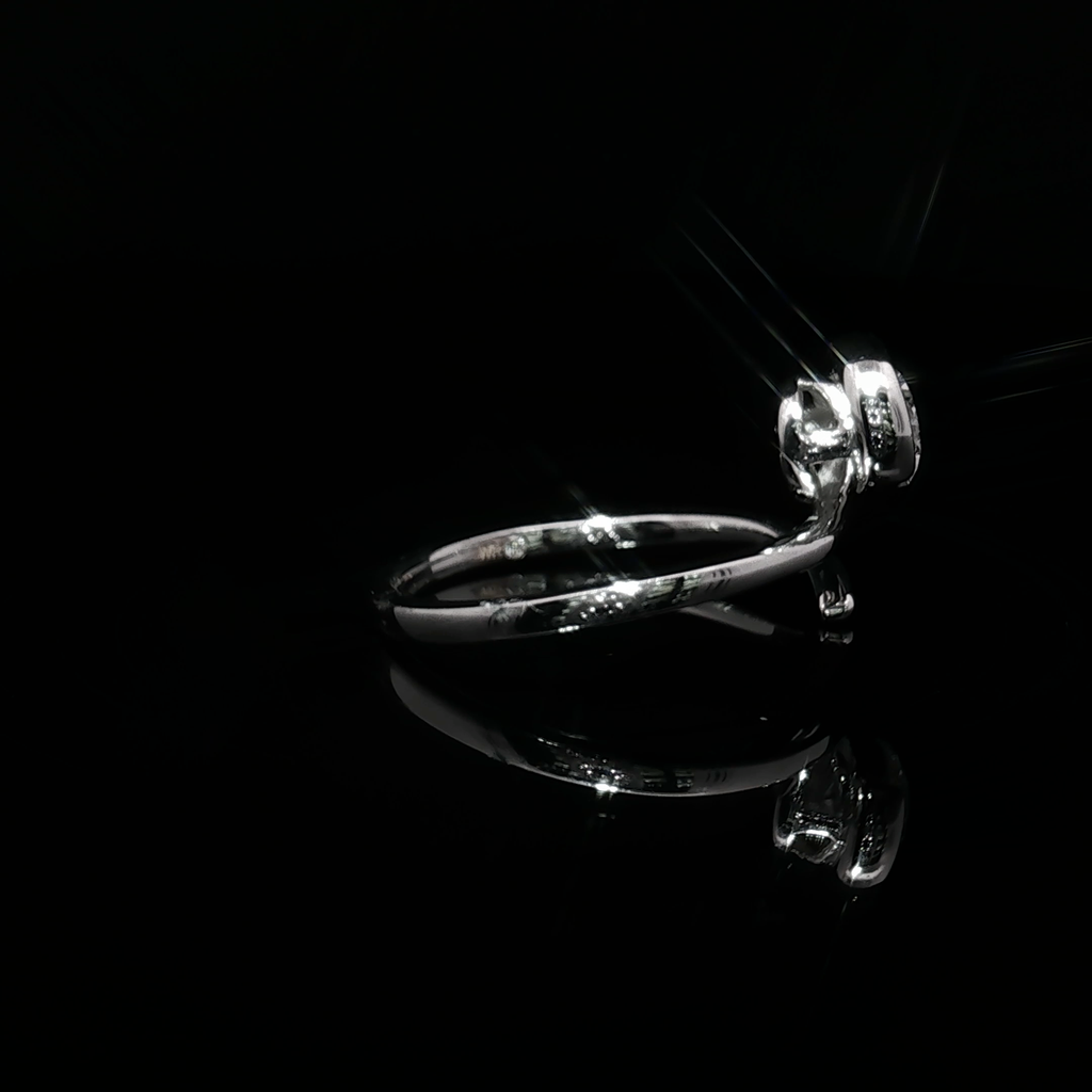 White Gold Solitaire Wrapping Ring with Pear Cut Diamond