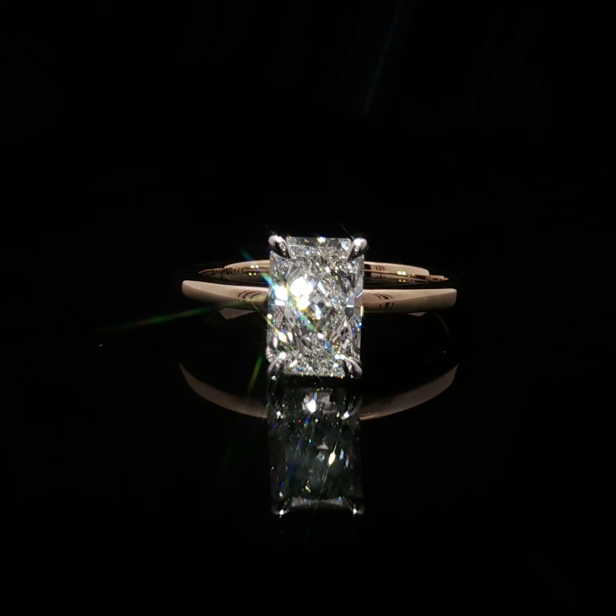 Emerald Cut Diamond Solitaire Ring in Yellow Gold