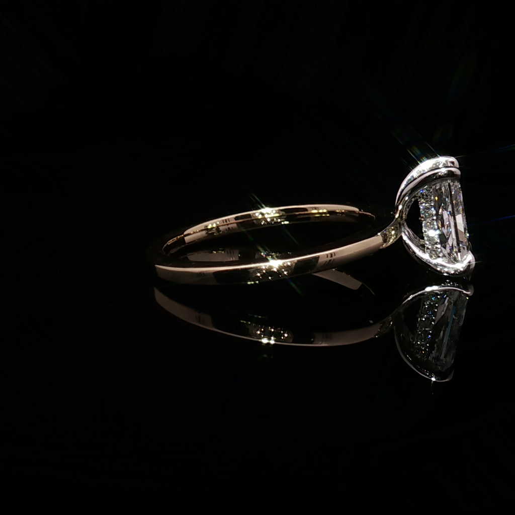 Emerald Cut Diamond Solitaire Ring in Yellow Gold