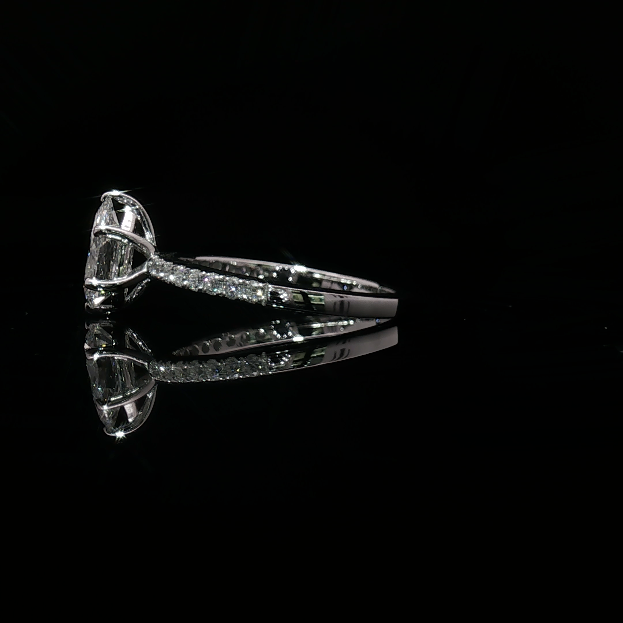 Pear Cut Diamond White Gold Multistone Ring