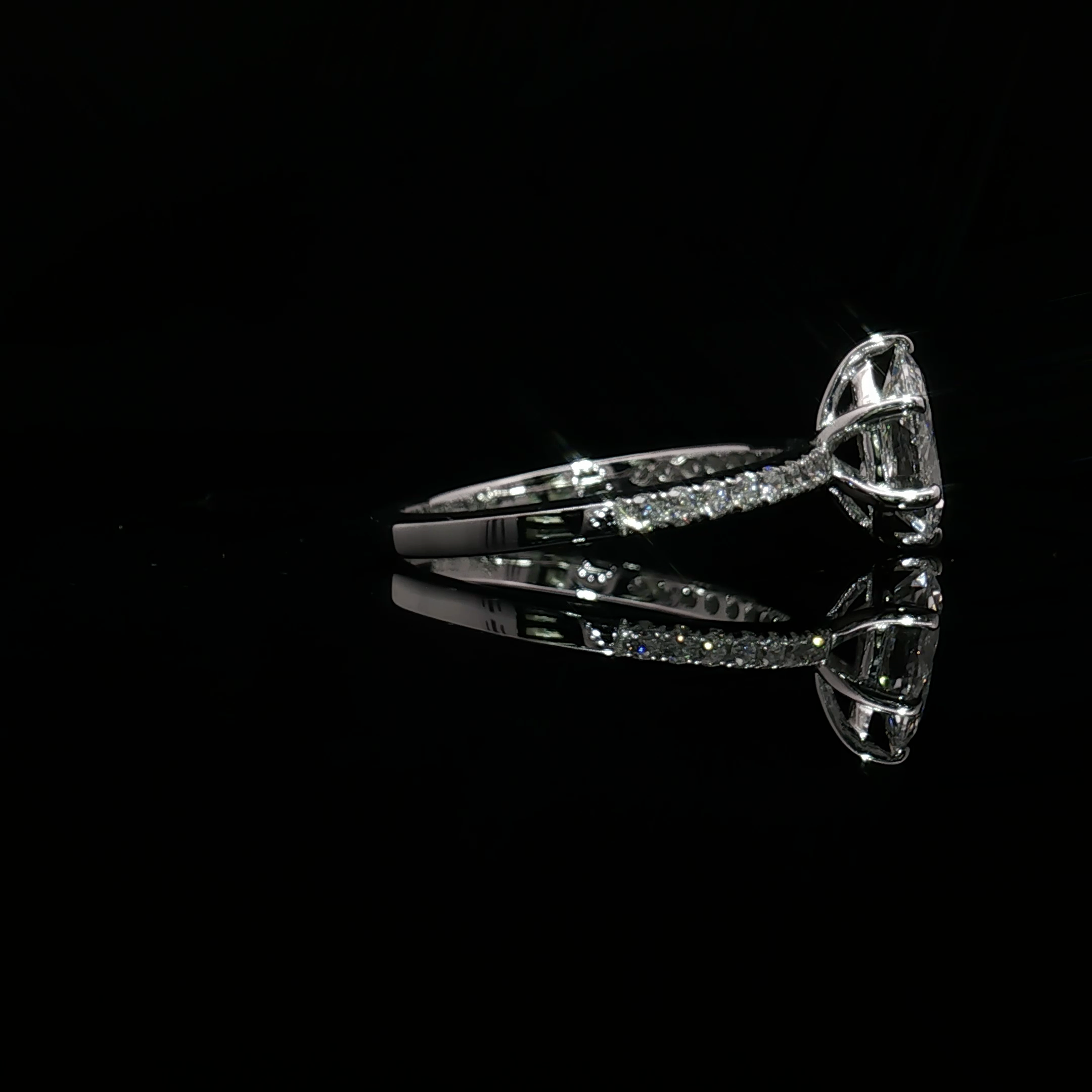 Pear Cut Diamond White Gold Multistone Ring