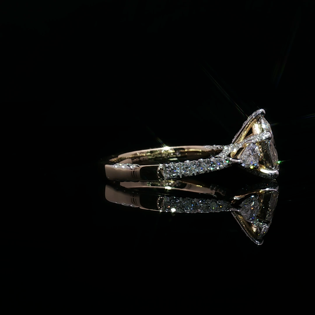 Pear Cut Diamond Multi-stone Ring in Yellow Gold