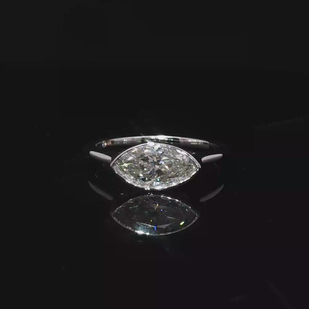 14K white Gold Solitaire Ring with Marquise Cut Diamond