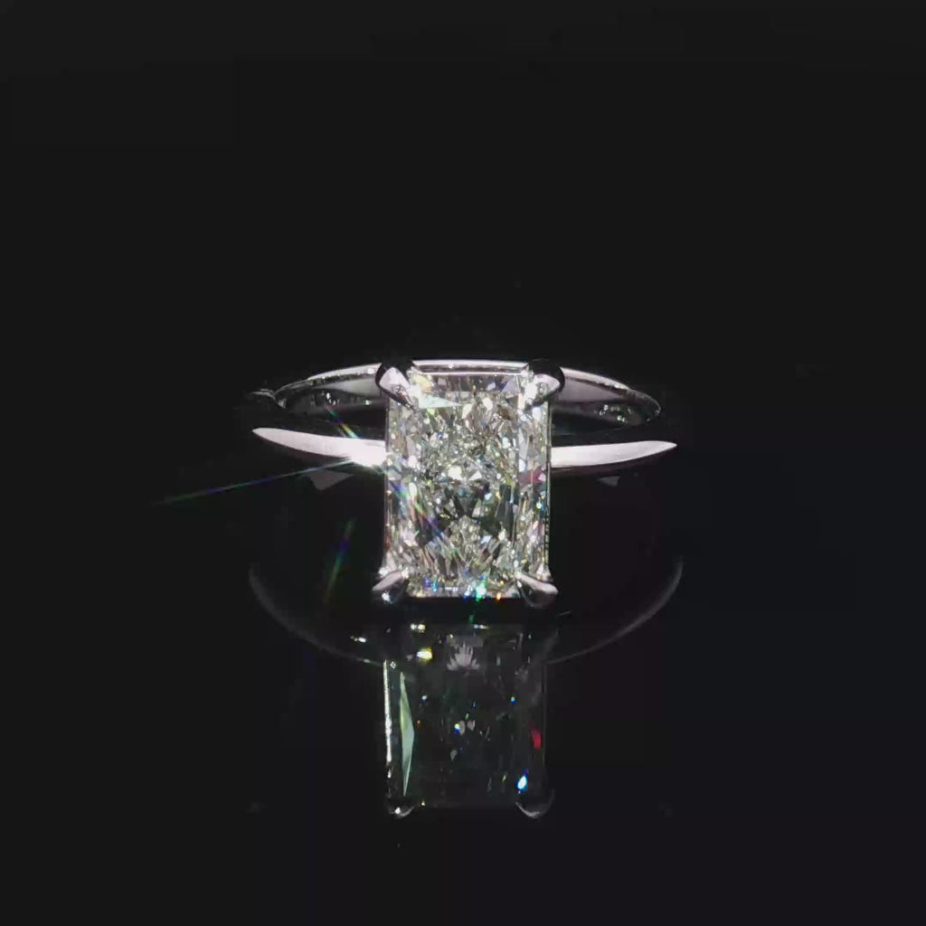 14K White Gold Solitaire Ring with Radiant Cut Diamond