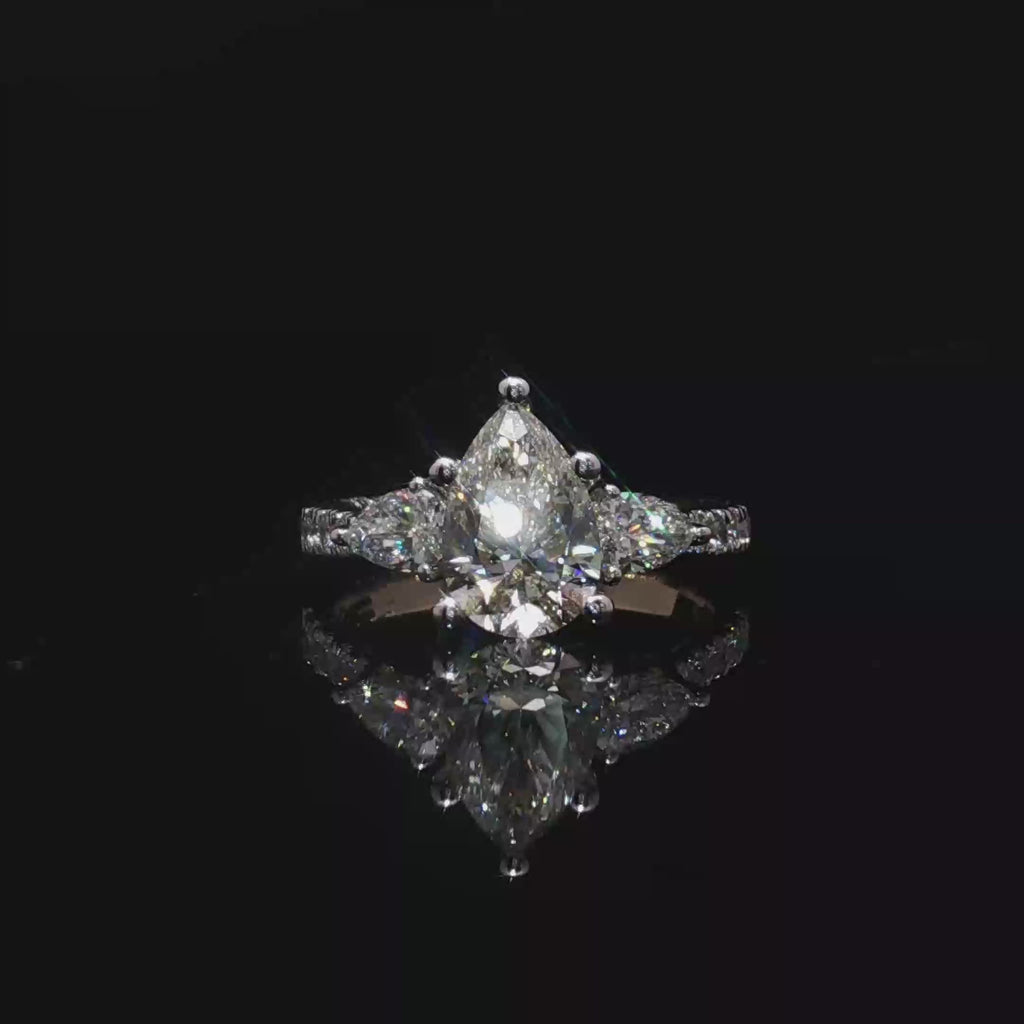 Pear Cut Diamond Multi-stone Ring in Yellow Gold
