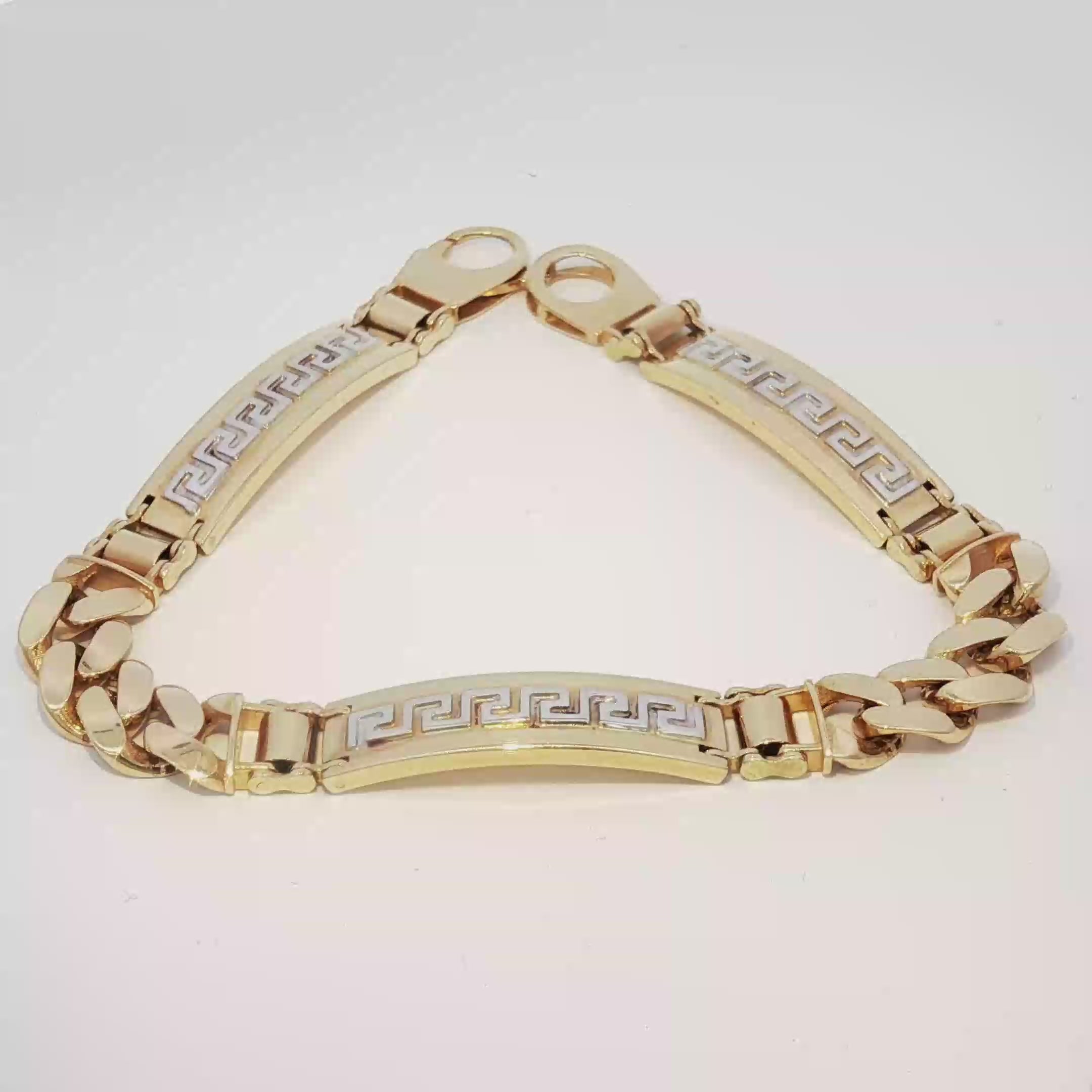 14k Gold Hollow Bracelet with Greek Design 8.5mm.