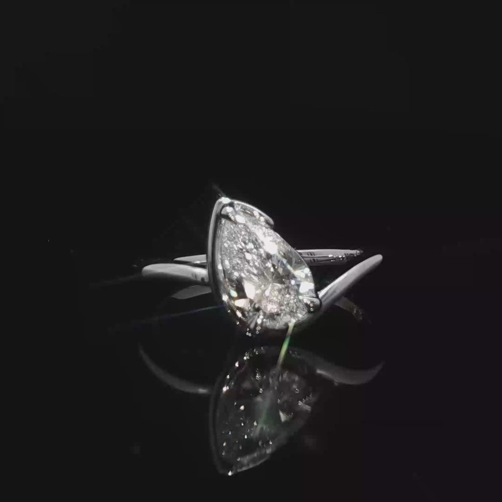 14K White Gold Solitaire Ring with Pear Cut Diamond