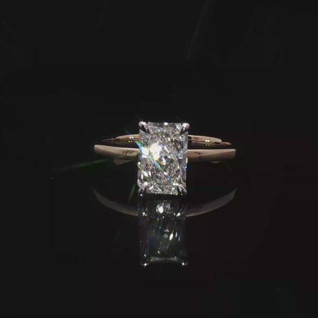 Emerald Cut Diamond Solitaire Ring in Yellow Gold