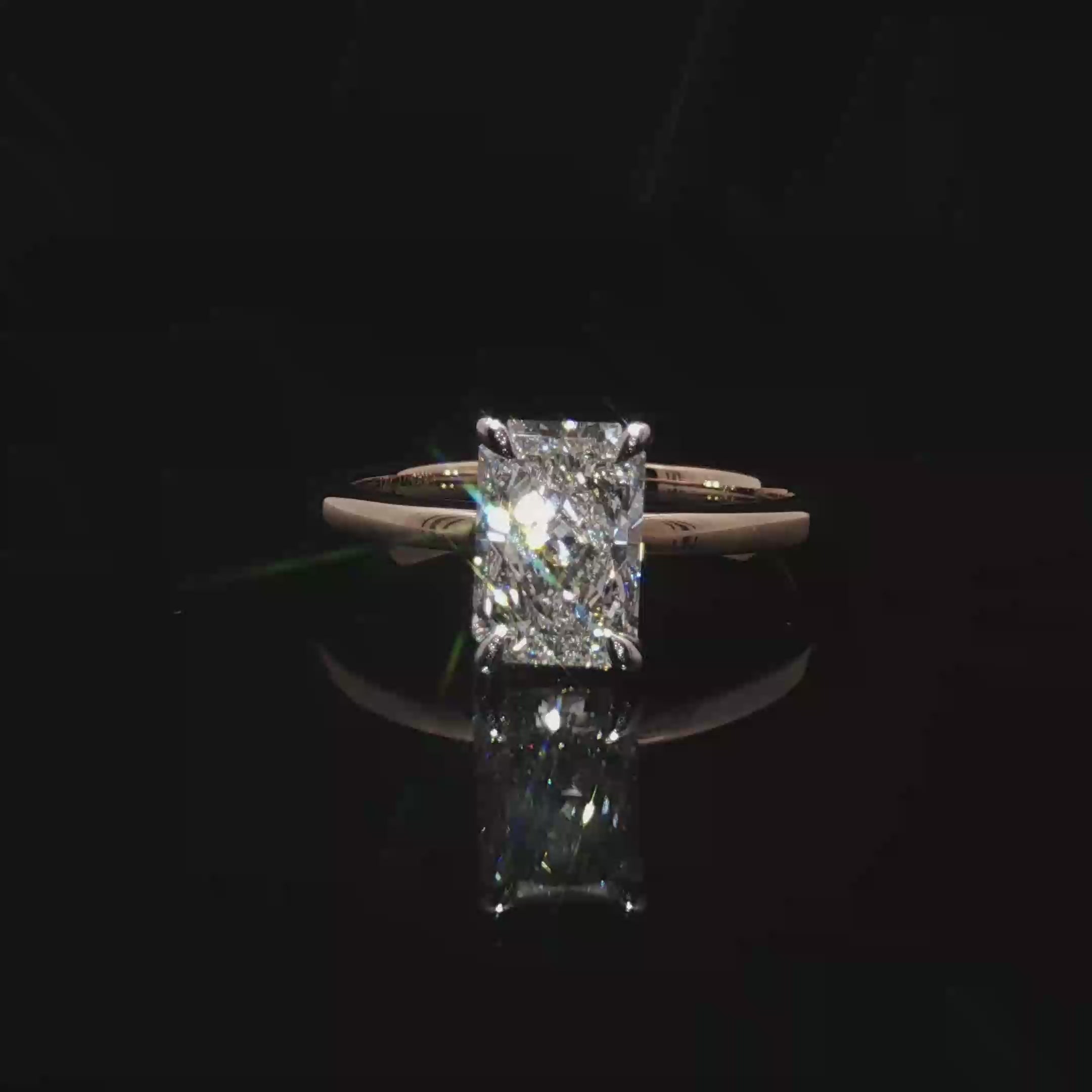 Emerald Cut Diamond Solitaire Ring in Yellow Gold